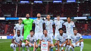 <p>MUSICALLY INSPIRED: Liverpool team's photo during the preseason friendly match between Liverpool and Machester United at Rajamangala Stadium. (Photo by Supakit Wisetanuphong/MB Media/Getty Images)</p>