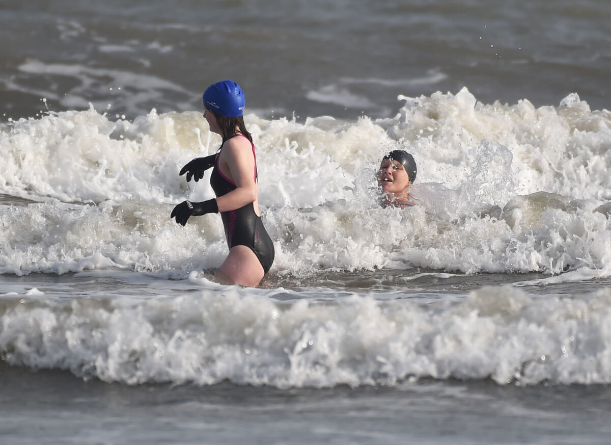 Locals Brigid Foley and her daughter Mai Power enjoying a swim in spring sunshine at Youghal beach in East Cork
