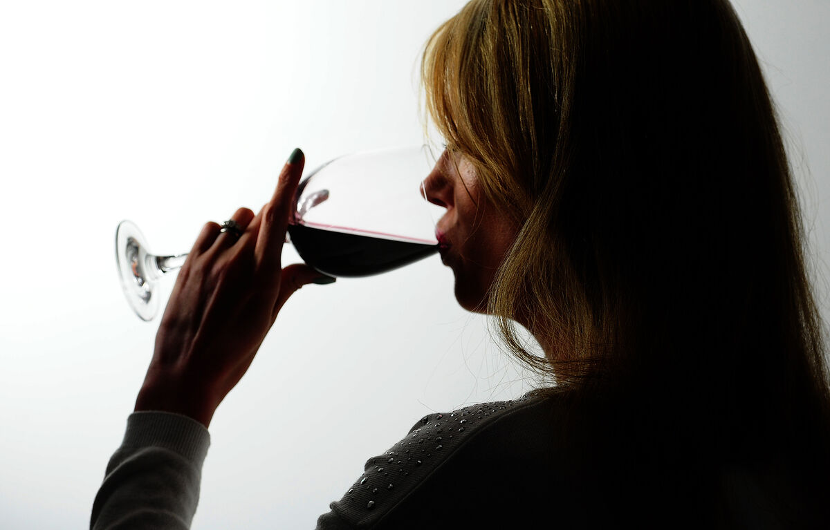 For women aged 15 to 39, the 'theoretical minimum risk exposure level' was the equivalent of about two tablespoonfuls of wine per day. For women aged 15 to 39, the 'theoretical minimum risk exposure level' was the equivalent of about two tablespoonfuls of wine per day.