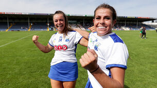 <p>AT THE DOUBLE: Waterford goalscorer Niamh Rockett celebrates after the game with Roisin Kirwan. ©INPHO/Laszlo Geczo</p>