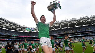<p>Diarmaid Byrnes of Limerick celebrates with the Liam MacCarthy Cup after the GAA Hurling All-Ireland Senior Championship Final match between Kilkenny and Limerick at Croke Park in Dublin. Photo by Ramsey Cardy/Sportsfile</p>