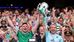 <p>TOP OF THE TREE: Limerick's Declan Hannon and Cian Lynch lift the Liam MacCarthy Cup. ©INPHO/Ryan Byrne</p>