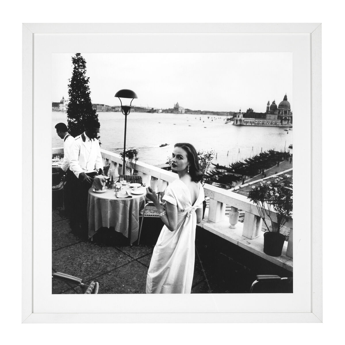 Vintage photographs can stir the era effortlessly. Here an illustration from Italian Vogue 1956 of a unnamed socialite at a sophisticated ocean-side setting evokes a wonderful atmosphere; €456.45 (Eichholtz), sweetpeaandwillow.com
