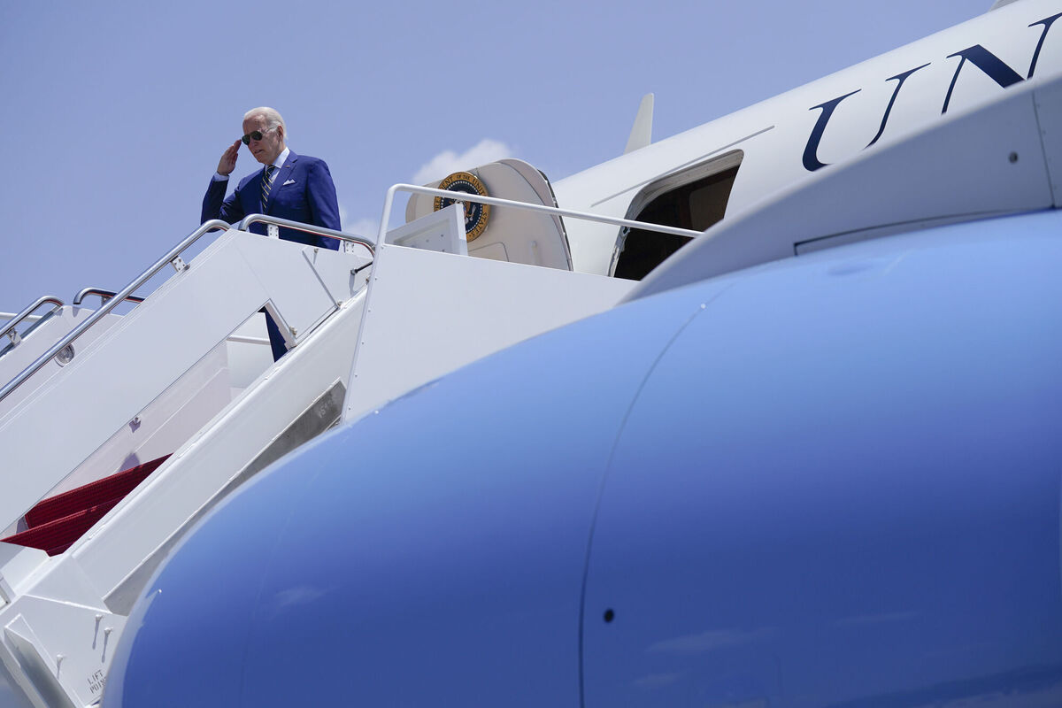 President Joe Biden returns a salute before boarding Air Force One for a trip to Somerset, Mass., to deliver remarks on the climate, Wednesday, July 20, 2022, in Andrews Air Force Base, Md. (AP Photo/Evan Vucci)