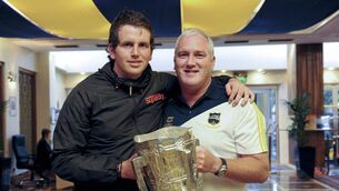 <p>BROTHER IN ARMS: Tipperary's Darragh Egan with his brother Colm celebrating with the Liam MacCarthy Cup after the 2010 All-Ireland final </p>