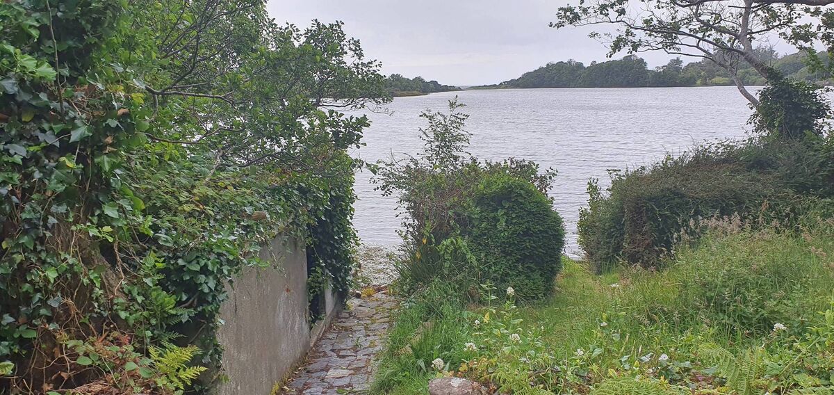 Carrigdhoun Quay is a stone's throw from the water. Carrigdhoun Quay is a stone's throw from the water.