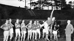 <p>LEAP: Kerry captain Mick O'Connell shows off his fielding skills to team trainer Dr Eamonn O'Sullivan and the some of his team mates in Fitzgerald Stadium during collective training before the 1959 All-Ireland. (Photograph courtesy The Kerryman)</p>