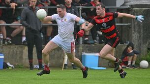 <p>ARM IN ARM: O'Donovan Rossa's David Shannon is held by Newmarket's Alan Ryan during the Bon Secours Cork SAFC at Macroom. Pic: Eddie O'Hare</p>