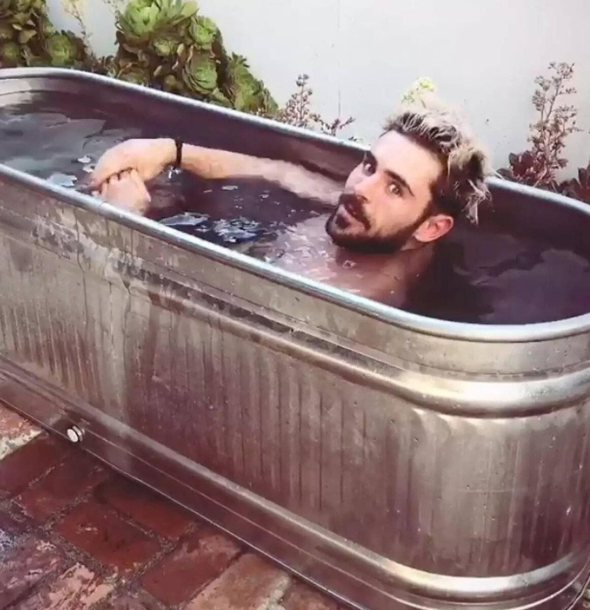 Zac Efron takes a dip in an ice bath