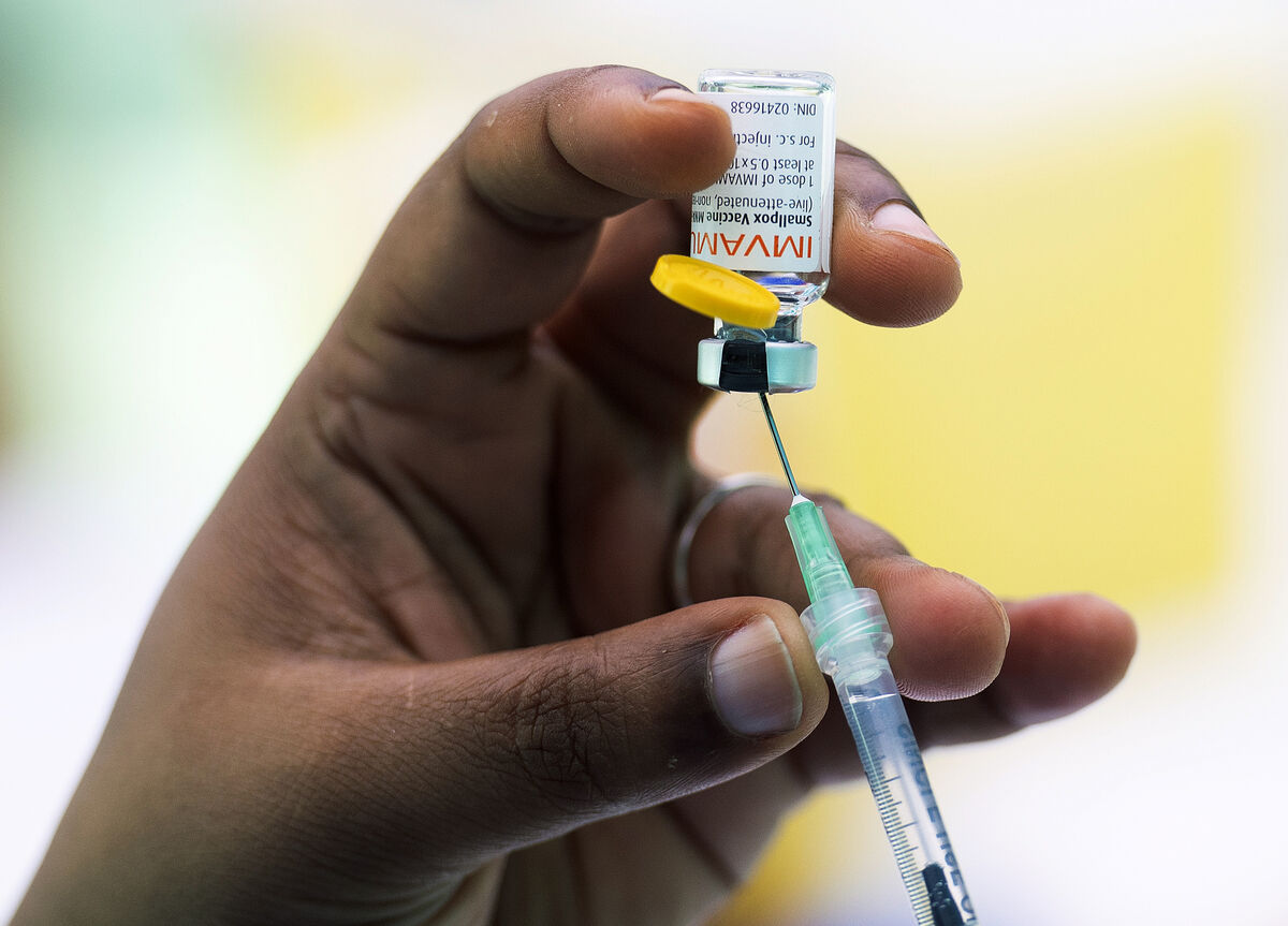 A health care worker prepares monkeypox vaccine in Montreal, Saturday, July 23, 2022. Tourists are among those lining up to get monkeypox vaccines in Montreal, as the World Health Organization declares the virus a global health emergency. (Graham Hughes/The Canadian Press via AP)