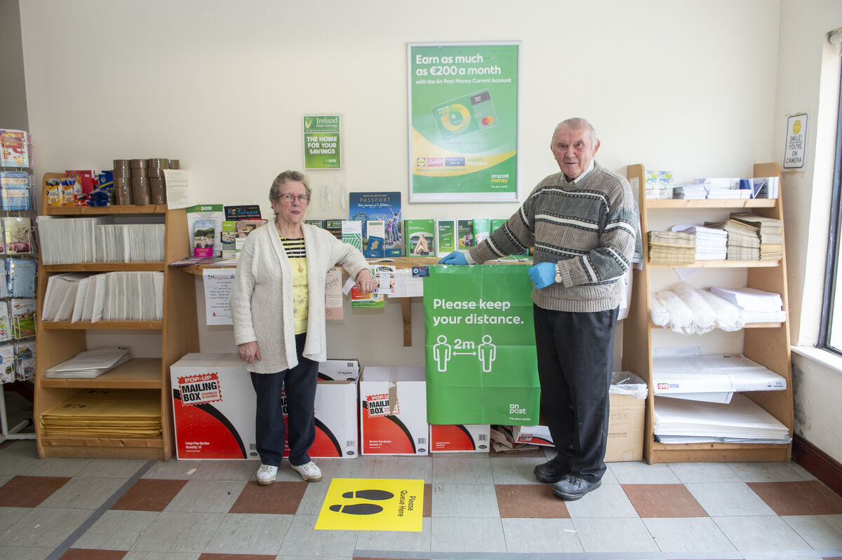 Frankie and Paddy O’Shea at the Upper Aghada Post Office, Co Cork; Paddy told the story of a woman who came into the post office and told hime she was the only human she met that week. Picture: Dan Linehan Frankie and Paddy O’Shea at the Upper Aghada Post Office, Co Cork; Paddy told the story of a woman who came into the post office and told hime she was the only human she met that week. Picture: Dan Linehan
