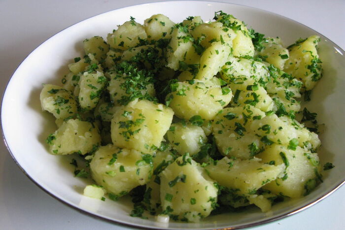 Potato, spring onion and nasturtium salad