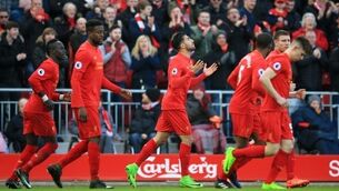 Emre shows Liverpool can hang among top four