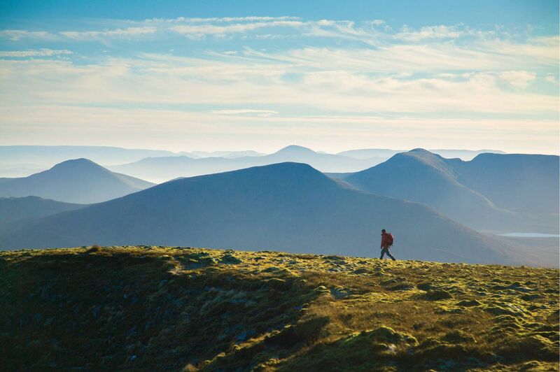 The summit ridge of Slieve Carr, County Mayo, the most remote mountain in Ireland. In the middle distance are the summits of Glennamong and Corranbinna. In the far distance are some of the other great mountains of Connacht, including, from left to right, Maumtrasna, the Sheeffry Hills, Croagh Patrick and Mweelrea. Taken from 'The Mountains of Ireland' by Gareth McCormack (The Collins Press, 2016)