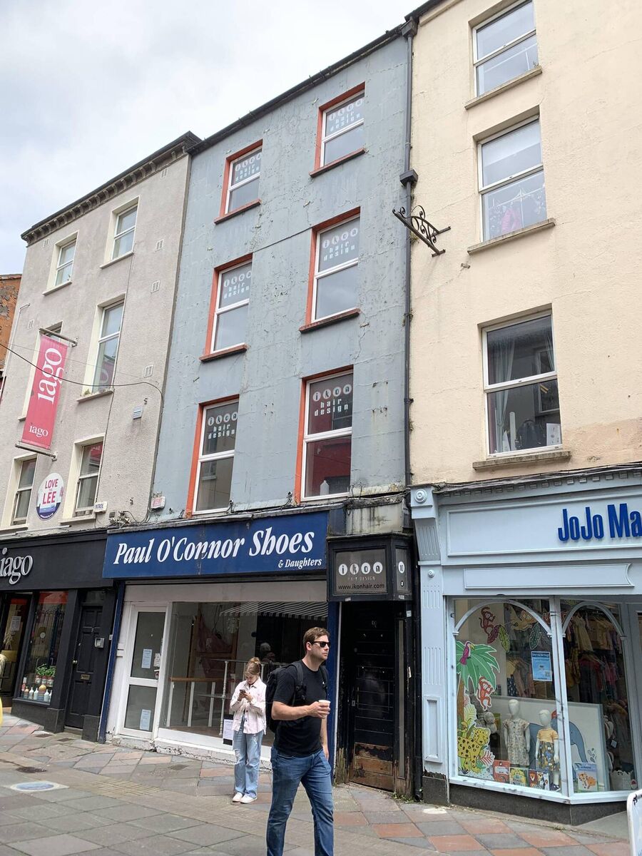 Almost a shoo-in. No 10 Princes Street was previously occupied by a shoe shop. It's on the St Patrick Street side of Princes Street, near the English Market