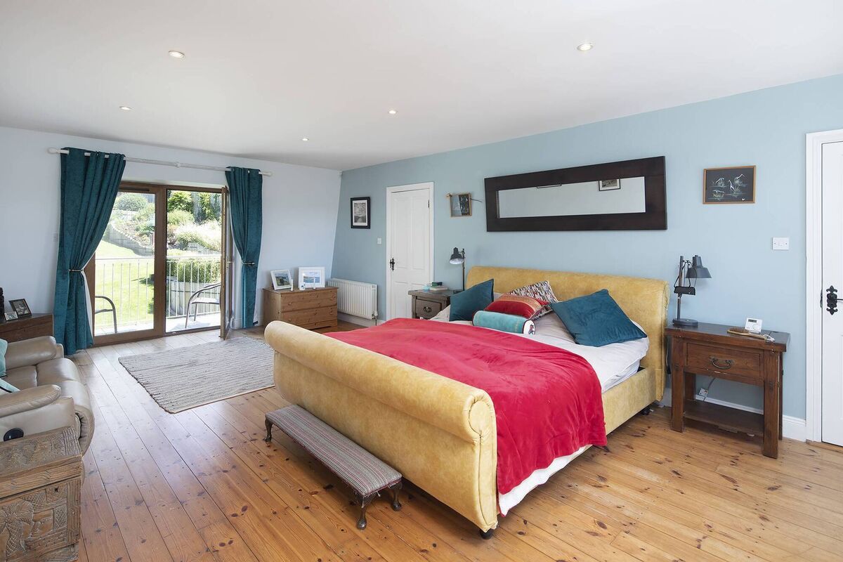 Main bedroom with doors to balcony Main bedroom with doors to balcony