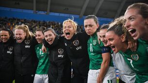 <p>GOING UP: Vera Pauw celebrates with her players in the team huddle. Ireland face crucial qualifiers in the coming weeks. </p>
