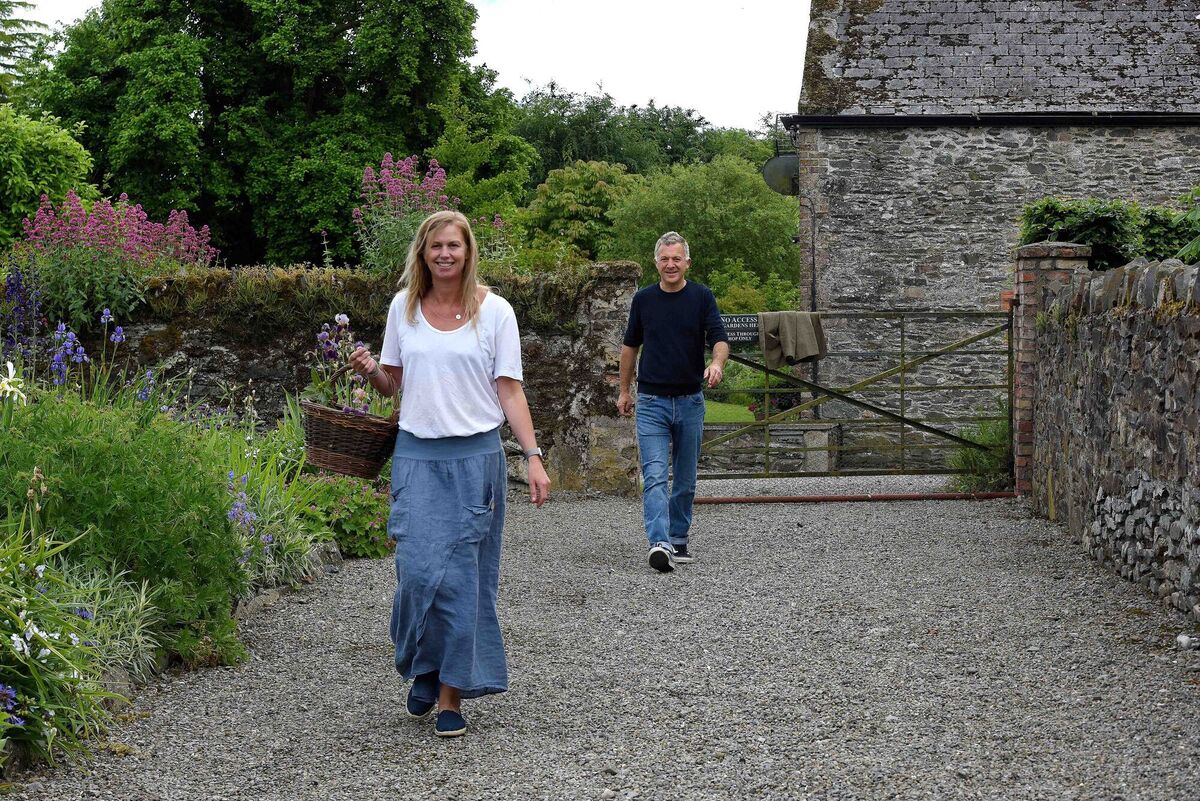 James and Joanna Fennell in their cottage garden . Photograph Moya Nolan James and Joanna Fennell in their cottage garden . Photograph Moya Nolan