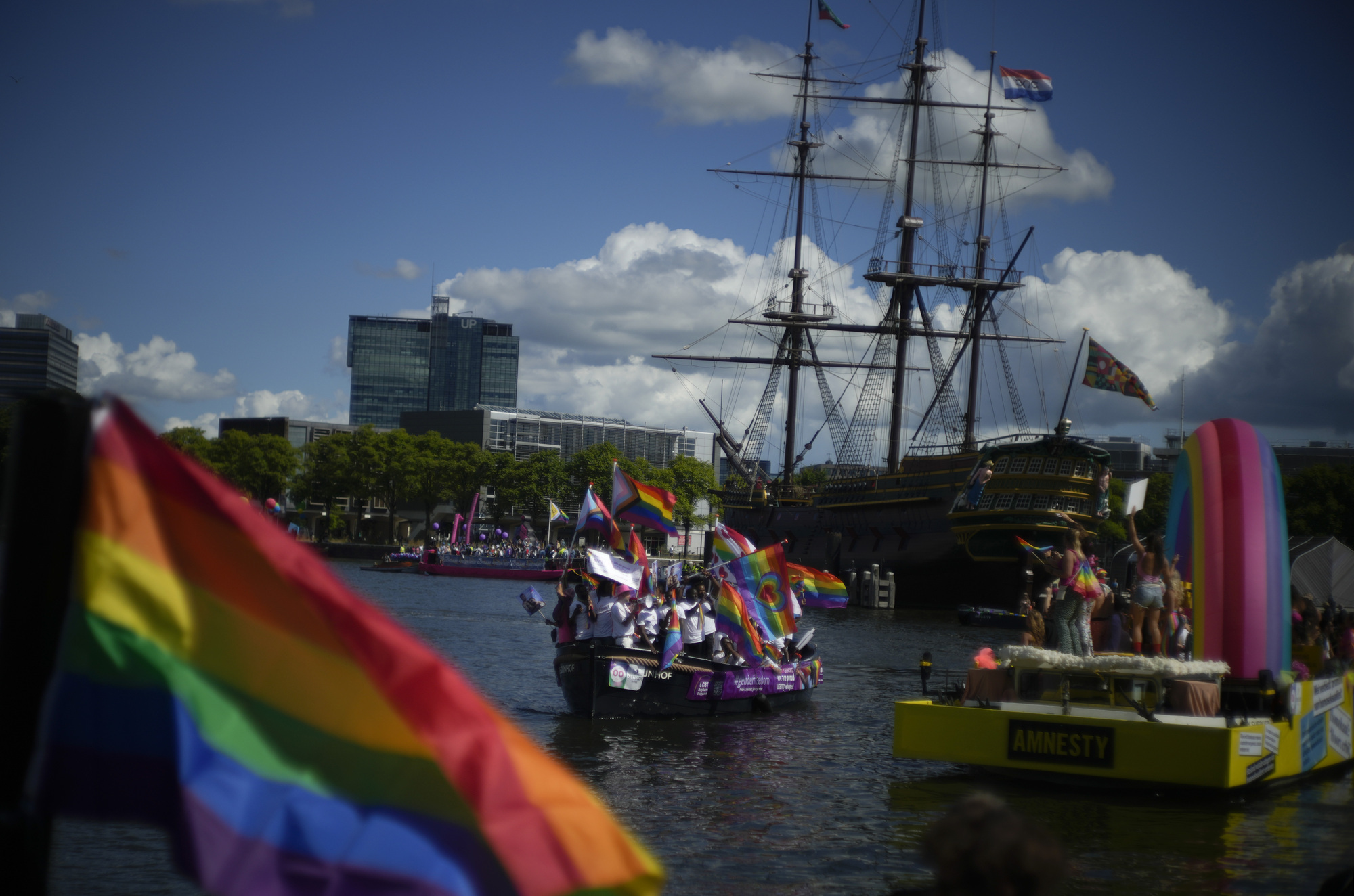 Huge crowds watch Amsterdam Pride’s canal parade celebration