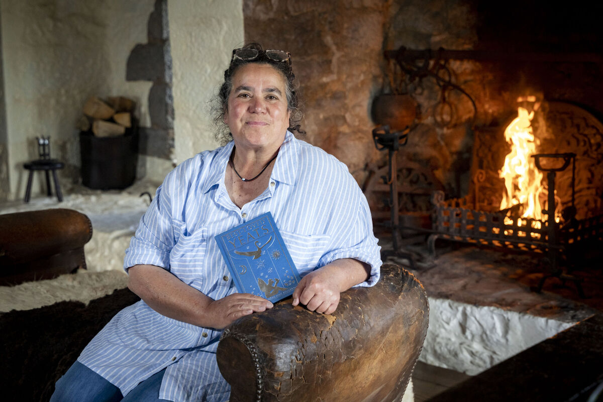 Sonja Bergin at home by the fire at Tullaun Castle.