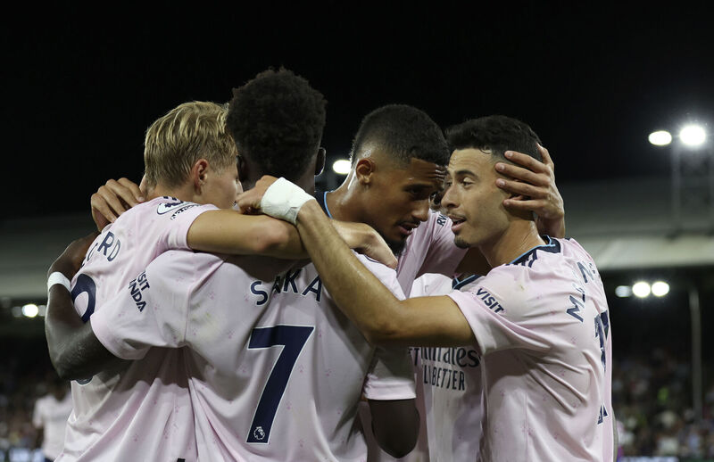 Arsenal players celebrate after Crystal Palace's Marc Guehi scores an own goal during the English Premier League soccer match between Crystal Palace and Arsenal at Selhurst Park stadium in London, Friday, Aug. 5, 2022. (AP Photo/Ian Walton) Arsenal players celebrate after Crystal Palace's Marc Guehi scores an own goal during the English Premier League soccer match between Crystal Palace and Arsenal at Selhurst Park stadium in London, Friday, Aug. 5, 2022. (AP Photo/Ian Walton)