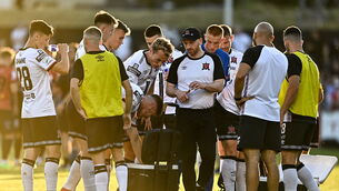 <p>COOLING OFF: Dundalk head coach Stephen O'Donnell, centre, speaks to his players in a water break during the SSE Airtricity League Premier Division match between Bohemians and Dundalk at Dalymount Park in Dublin. Pic: Sam Barnes/Sportsfile</p>