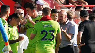 Manchester United manager Erik ten Hag issues instructions to his players (John Walton/PA)
