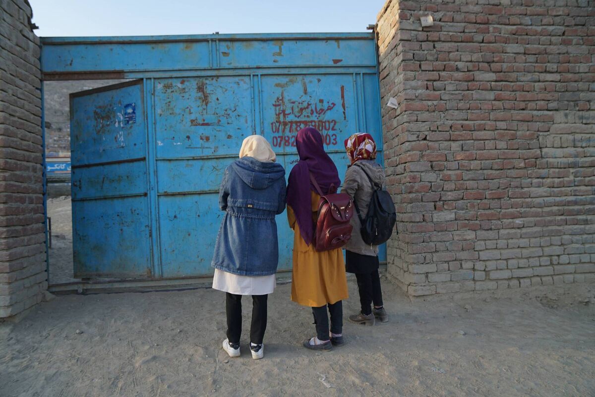 Schools girls outside Sayed Ul-Shuhada school in West Kabul. The girls’ secondary school was the site of a devasting attack in May 2021. 