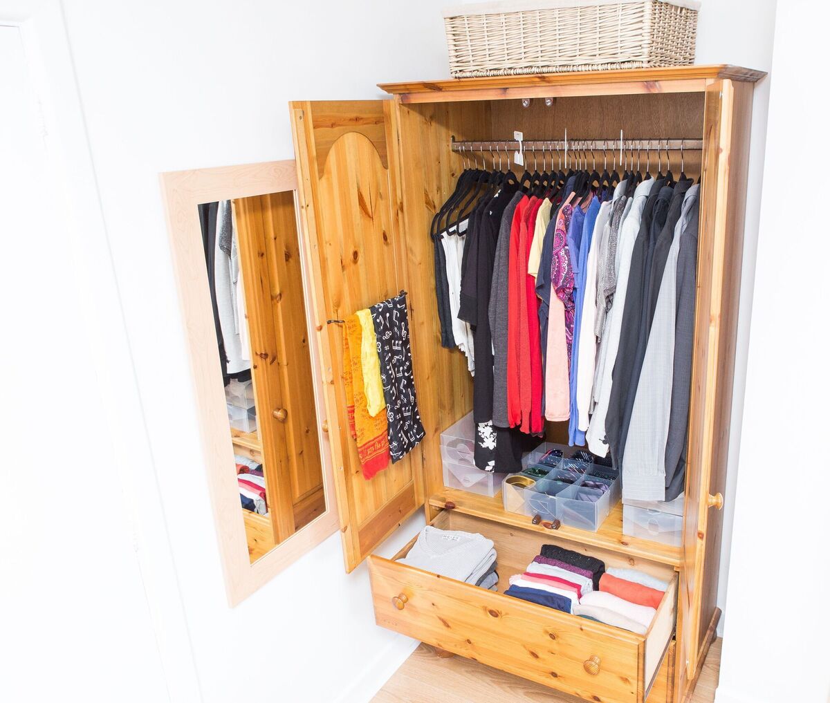 This wardrobe 'after' picture shows how Sarah brings order using a colour system, a folding system and handy storage for smaller items. This wardrobe 'after' picture shows how Sarah brings order using a colour system, a folding system and handy storage for smaller items.