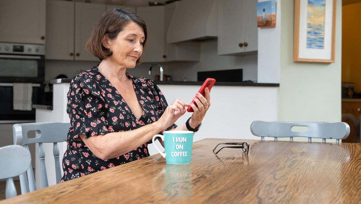 Garvey easily checks her electricity usage at the kitchen table. 