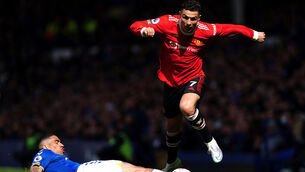 Everton’s Allan (left) attempts a tackle on Manchester United’s Cristiano Ronaldo during the Premier League match at Goodison Park, Liverpool, on April 9 (PA)