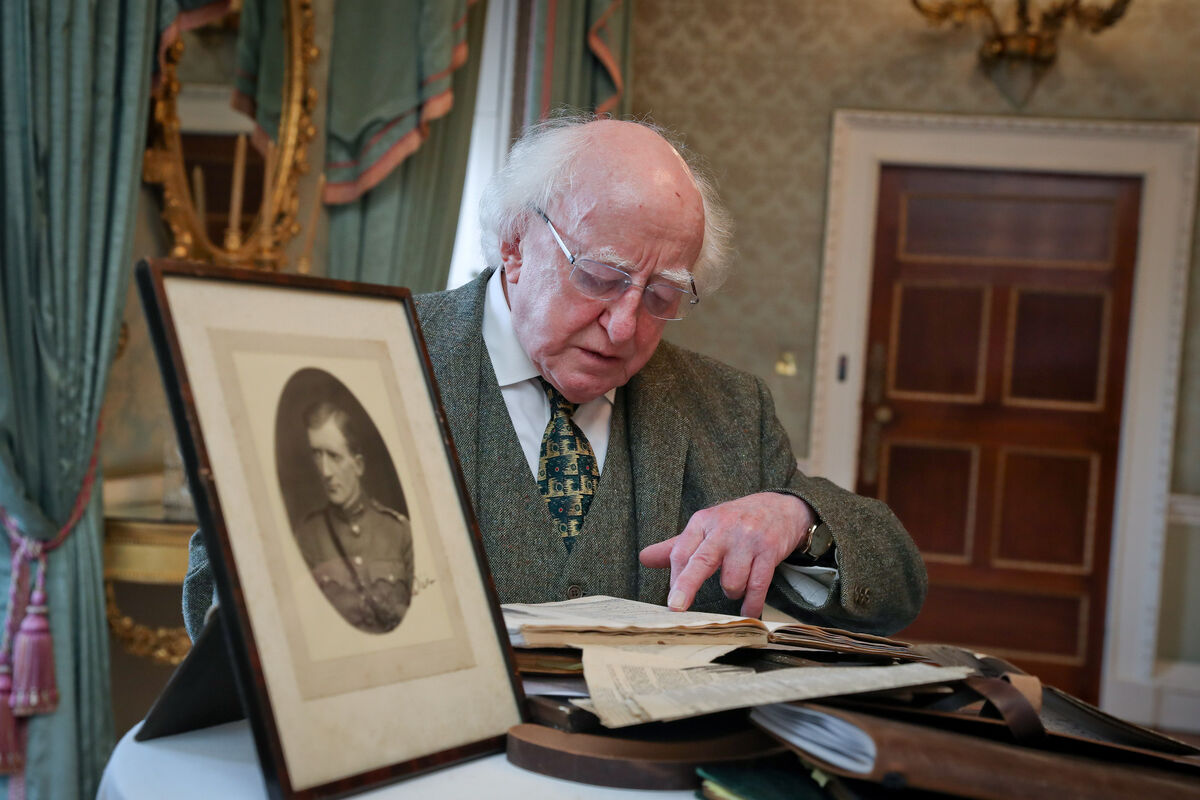 President Higgins looks at memorabilia from the Treaty negotiations in London in 1921, of which Collins was a key player. Picture: Maxwells