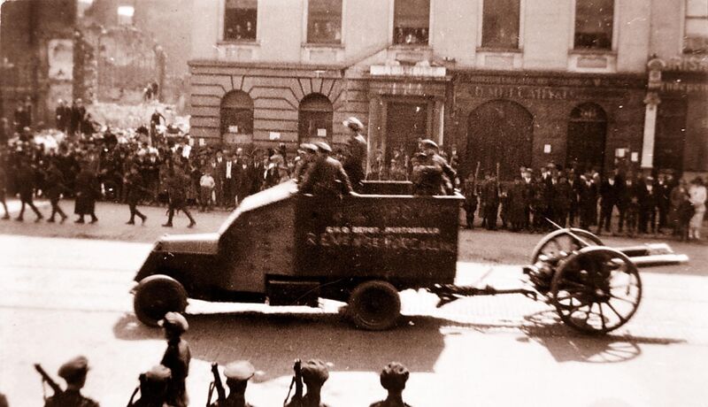 Michael Collins' funeral cortege in Patrick Street, Cork city. The slogan on the side says "Revenge for Collins". Photo: Prof. W J O'Donovan/Military archives Michael Collins' funeral cortege in Patrick Street, Cork city. The slogan on the side says "Revenge for Collins". Photo: Prof. W J O'Donovan/Military archives