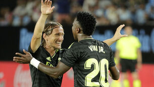 Luka Modric, left, and Vinicius Junior celebrate Real Madrid’s third goal (Lalo R. Villar/AP)