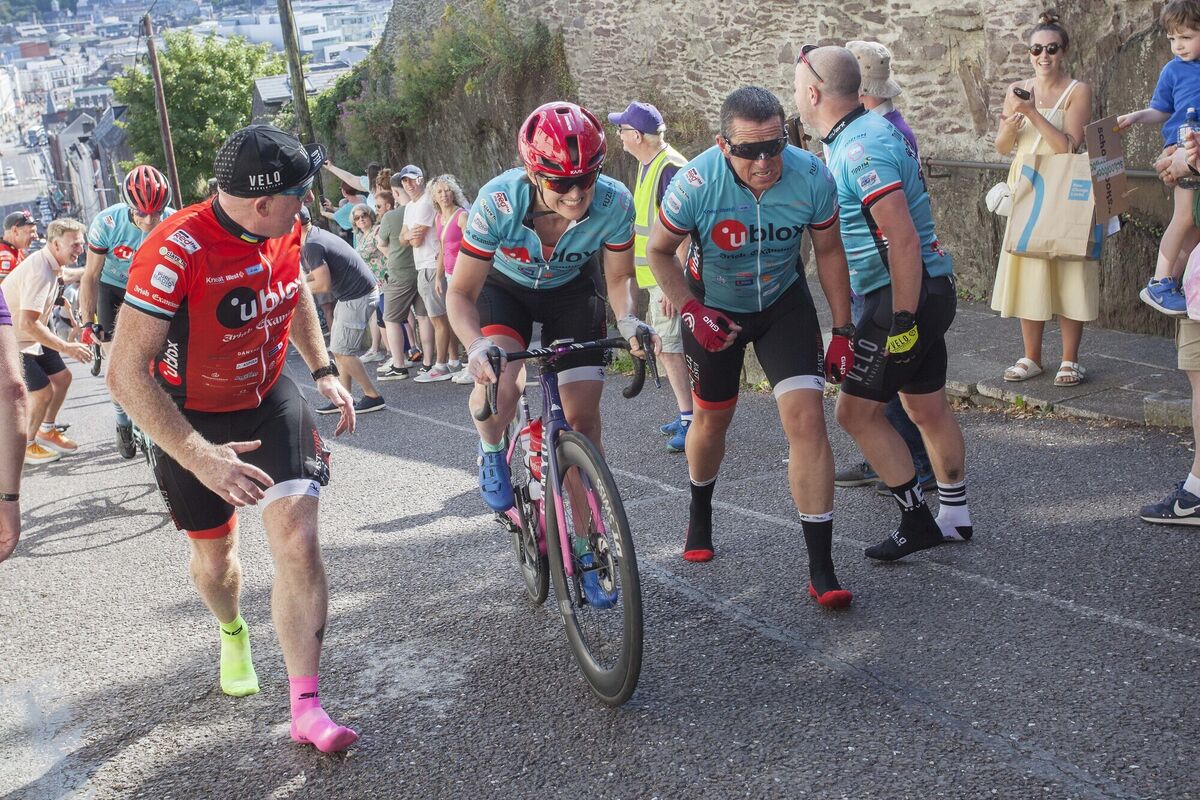 A cyclist is encouraged up a gruelling Patrick's Hill, at the end of this year's event.
