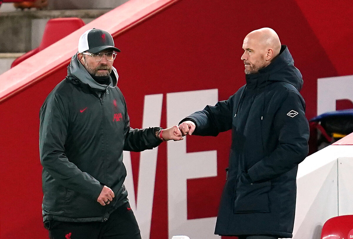 Erik ten Hag (right) and Liverpool manager Jurgen Klopp.
