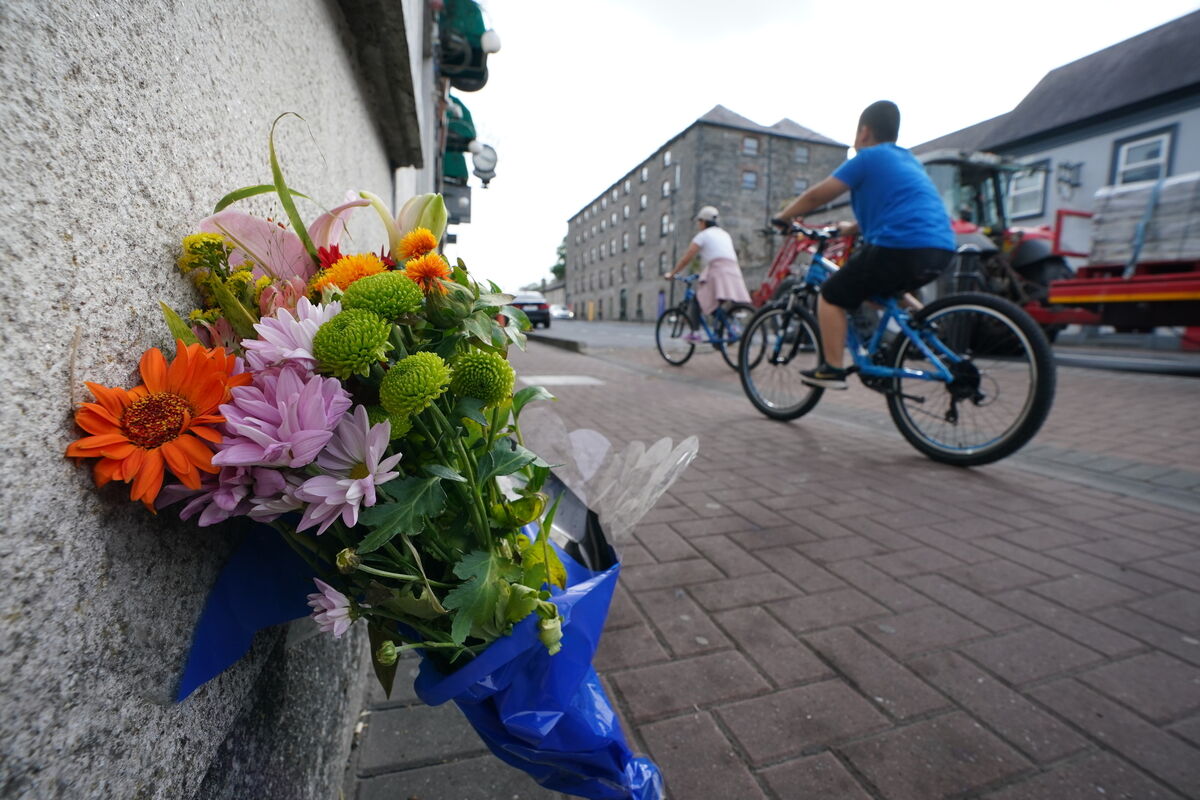 Flowers at the scene in Monasterevin, Co Kildare, where Dylan McCarthy was assaulted and later died at Tallaght University Hospital. 