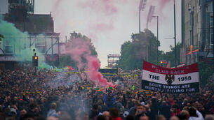 <p>Fans gathered in large numbers ahead of Manchester United’s clash with Liverpool on Monday (Peter Byrne/PA)</p>