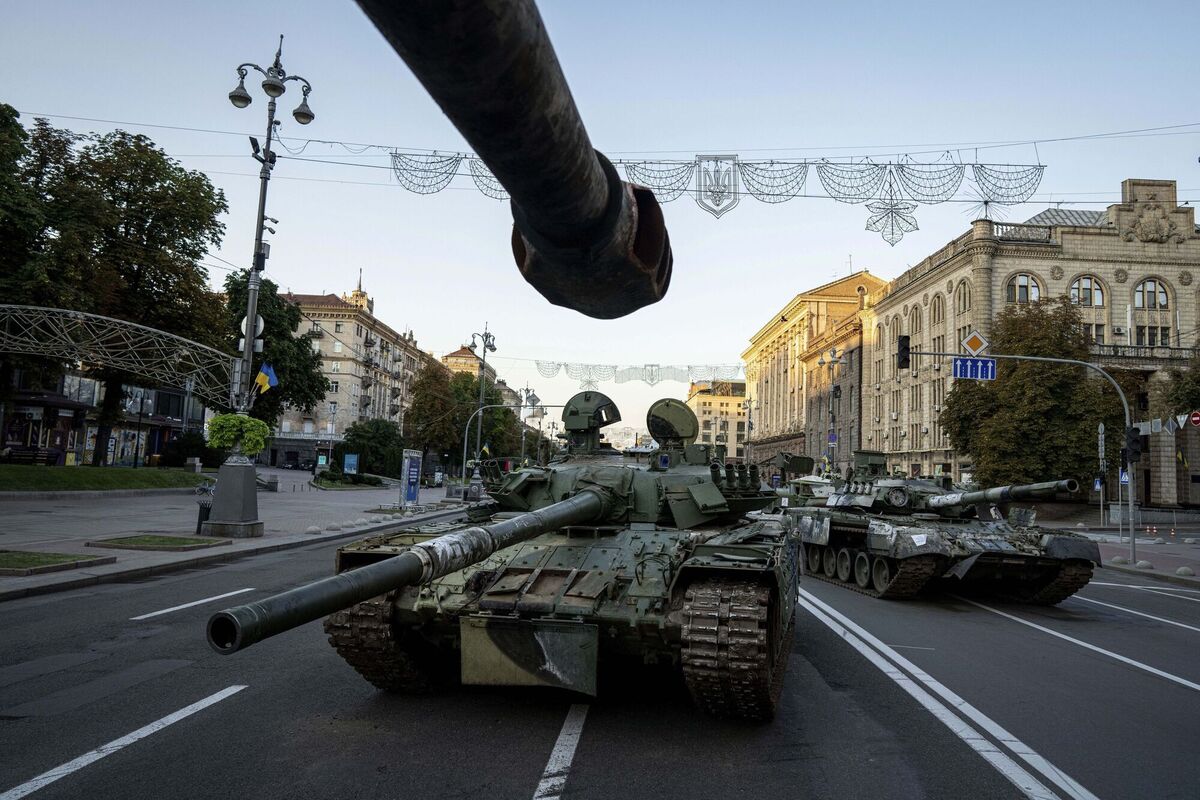 Captured Russian military vehicles on show in Kyiv on Ukraine's independence day. Locals took selfies in front of the wreckage of Russia's military might. Picture: Evgeniy Maloletka/AP