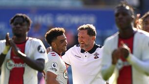 <p>STAYING PUT: Ralph Hasenhuttl (right) is adamant Che Adams (left) will not be leaving St Mary’s. Pic: Joe Giddens/PA</p>