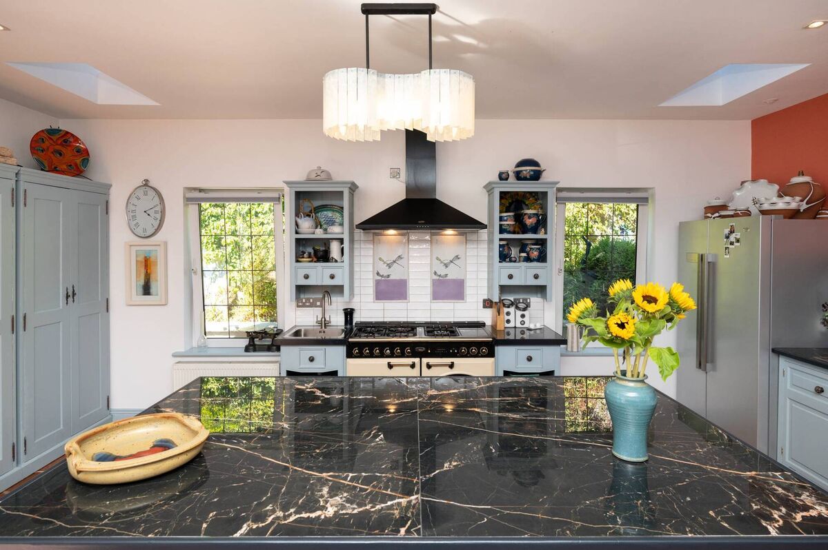 Kitchen section seen over large island