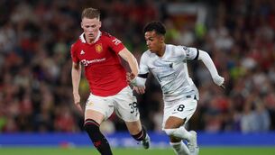 <p>CHANCE TO SHINE: Fabio Carvalho of Liverpool runs with the ball whilst under pressure from Scott McTominay of Manchester United   (Photo by Clive Brunskill/Getty Images)</p>