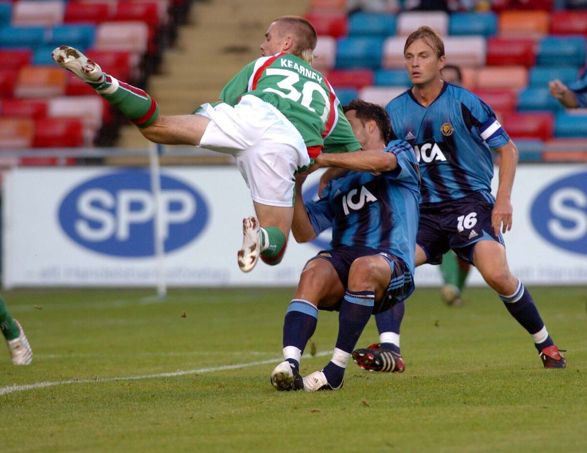 Cork city's Liam Kearbney is tackled by Djurgardens Matias Concha during the UEFA cup game in Stockholm in 2005. 