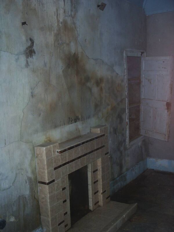 Before: In this room, Maggie replaced the original fireplace and set to work with her paintbrush.