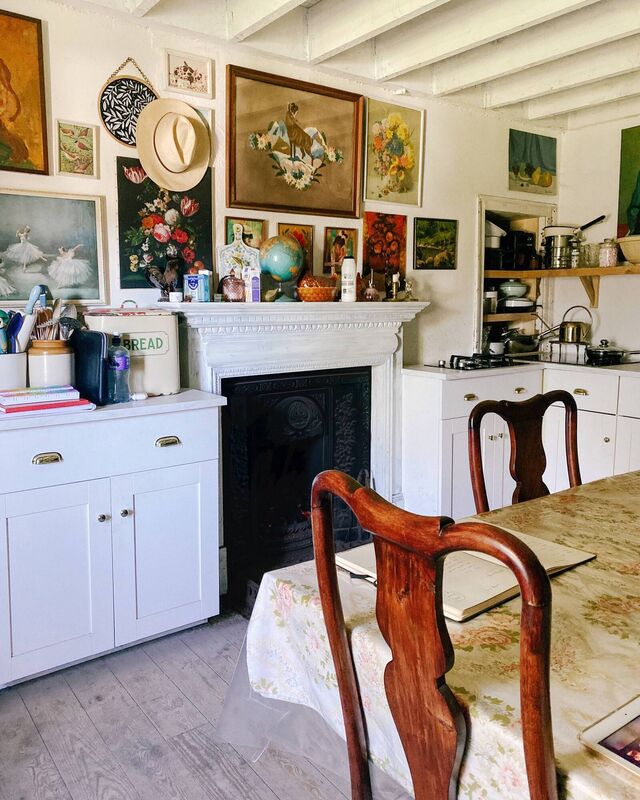 After: Maggie painted the walls and replaced the wooden floor with a new one.