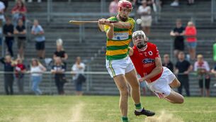 <p> Alan Connolly, Blackrock is hooked by Jack Buckley, Charleville during their Co-Op Superstores Premier SHC. match at Mallow, Co Cork. </p>