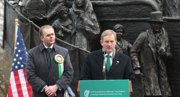 Taoiseach Enda Kenny stands with Minister of State for the Diaspora and International Development TD Joe McHugh at the Irish Memorial in Philadelphia.