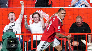 <p>Antony celebrates a debut goal for Manchester United (Martin Rickett/PA)</p>