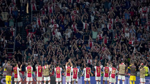 <p>TOP CLASS: Ajax players celebrate at full time. Photo: Zac Goodwin/PA Wire.</p>