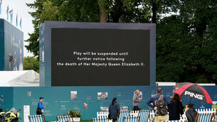 <p>ANNOUNCEMENT: A screen displays a message that play has been suspended following the announcement of the death of Queen Elizabeth II, during day one of the BMW PGA Championship. </p>